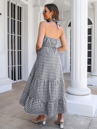 Dress Wholesale Deep V-neck hanging neck skirt with ruffled hem, large swing long skirt, A-line skirt, European and Amer