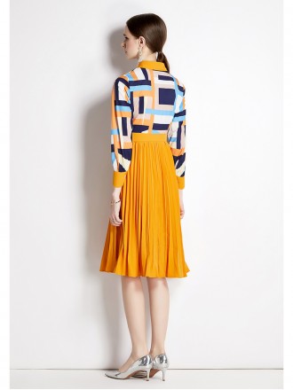 Dress Wholesale New INS wind personality fashion printing high -level sensation single -breasted stitching pleated dress