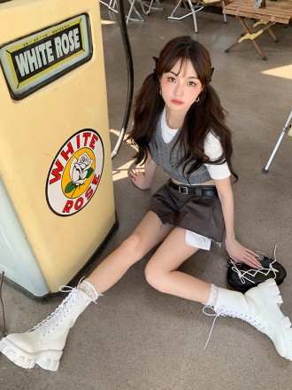Summer new design niche low -waisted fold skirt is thin, sweet cool half skirt pants, female with belt